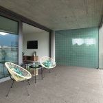Large,Terrace,Of,A,Luxury,Apartment.,Two,Poltropne,For,Relaxation